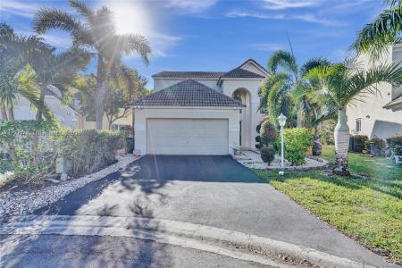 7698 Hibiscus Ln, Coral Springs, FL 33065