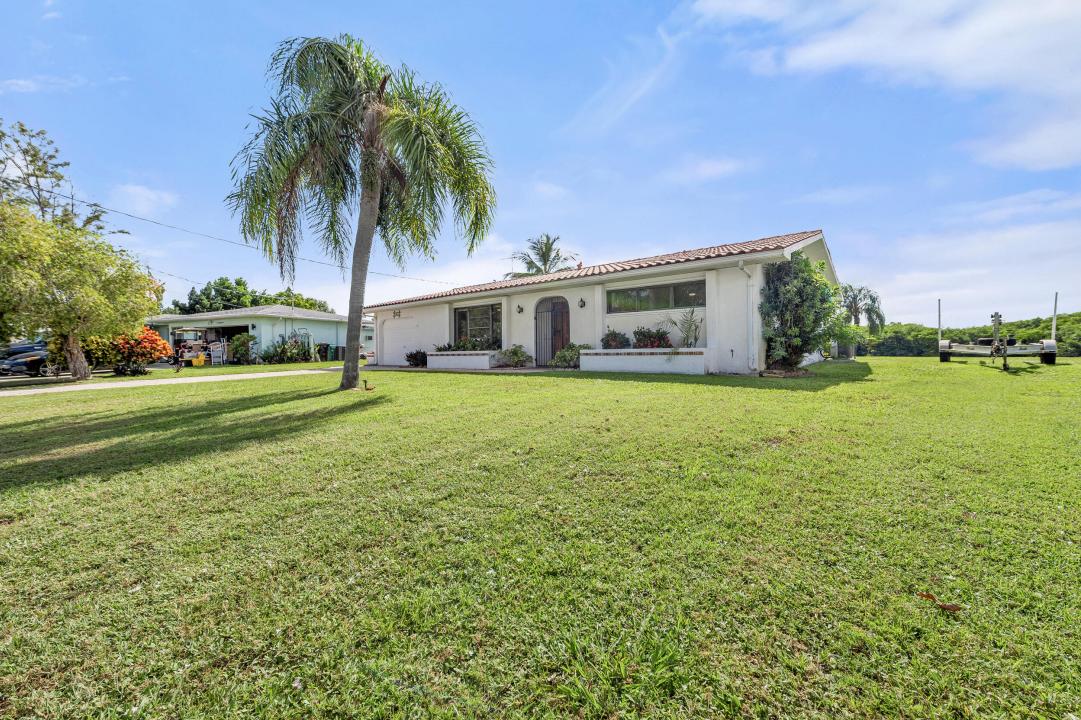 1075 SE Coral Reef Street, Port Saint Lucie, Florida 34983