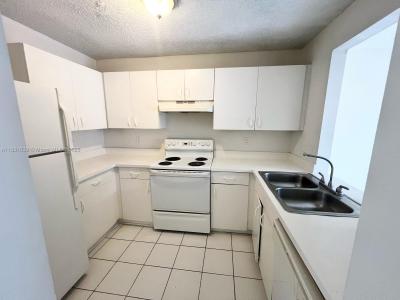 910 Cypress Way E, Palm Springs, FL 33406